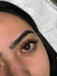LASHED BY AT